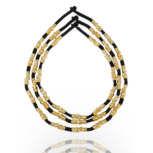 stacked gold plated and black thread necklace